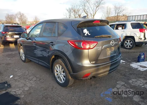 2013 Mazda Cx-5 Touring z USA, uszkodzony, nr VIN JM3KE4CE5D0126831